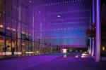 Dreaming in Color: Nine metal-mesh scrims frame a promenade, extending the lobby of McCaw Hall. Viewing of the accumulated layers magnifies the potential for live light-color mixing. Five “melodies for the eyes” play in a weekly color-field sequence.
In 2017 an LED upgrade was designed along with new programmed sequences. Additionally, the new, energy-efficient design is being utilized as a “playground” for visiting artists and designers to experiment with the complexity of scale, transparent surfaces and colored light.