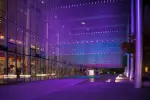Dreaming in Color: Nine metal-mesh scrims frame a promenade, extending the lobby of McCaw Hall. Viewing of the accumulated layers magnifies the potential for live light-color mixing. Five “melodies for the eyes” play in a weekly color-field sequence.
In 2017 an LED upgrade was designed along with new programmed sequences. Additionally, the new, energy-efficient design is being utilized as a “playground” for visiting artists and designers to experiment with the complexity of scale, transparent surfaces and colored light.