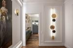 This photo shows not only the created interior and lighting design, but also the wall light compositions.